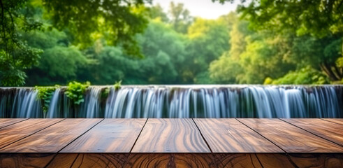 Empty wooden table with tropical rainforest valley landscape and waterfall. Perfect scene for showcasing or displaying your products.