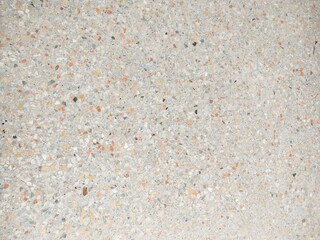 Polished stone floor in a variety of beautiful colors.