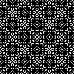 White background with black pattern. Seamless texture for fashion, textile design,  on wall paper, wrapping paper, fabrics and home decor. Simple repeat pattern.