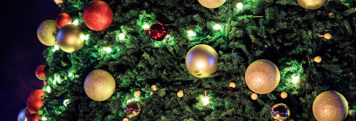 Obraz na płótnie Canvas Christmas toys on fir tree
