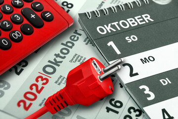 Konzept Energie und Deutscher Kalender Datum 1. Oktober 2023 mit Rechner