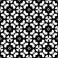 White background with black pattern. Seamless texture for fashion, textile design,  on wall paper, wrapping paper, fabrics and home decor. Simple repeat pattern.