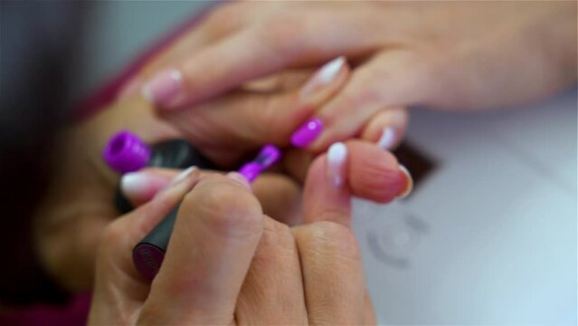 Manicure. Color Nail Varnish, Woman Having A Manicure