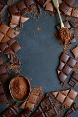Slices of dark and milk chocolate . Top view with copy space.
