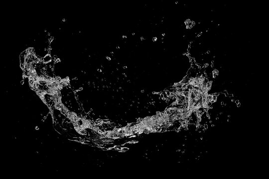 Water splash isolated on black background.