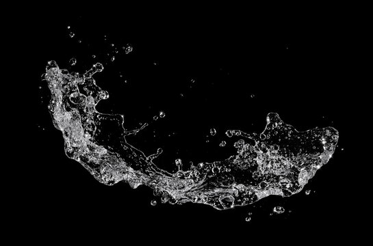 Water splash isolated on black background.