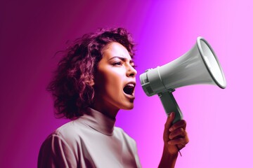 A woman using a megaphone to amplify her voice
