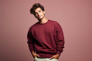 Isolated Portrait of a Fictional Male Model Wearing a Large Oversized Burgundy Colored Sweatshirt on a Plain Blank Background. Generative AI.