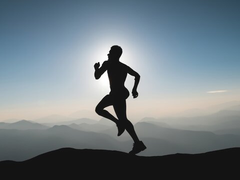 silhouette of a running person in the evening