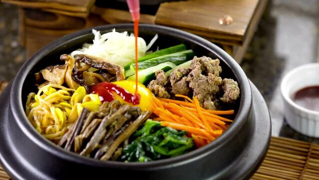 Korean Culinary Delight: 4K Video of Bi Bim Bap - Rice with Mixed Vegetables