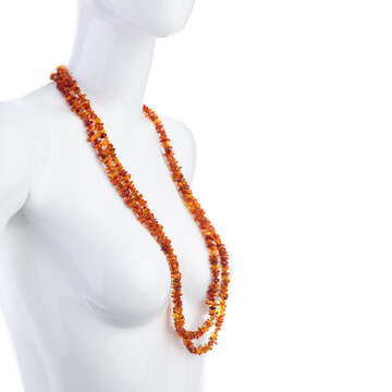 Amber necklace on mannequin isolated