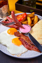Breakfast with potatoes and bacon