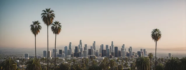 Foto op Canvas Los Angeles skyline with palm trees in the foreground © @uniturehd