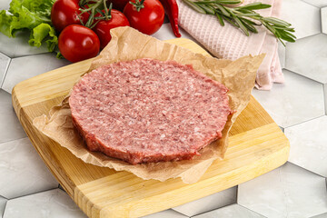 Raw beef uncooked burger cutlet