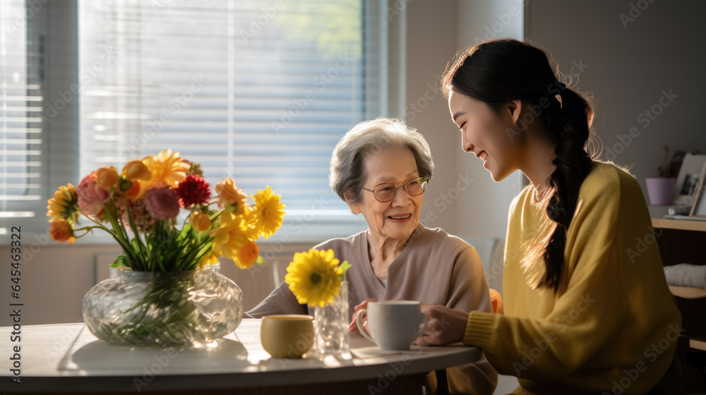 Wall mural Granddaughter gives grandmother a bouquet of flowers for her birthday in honor of March 8