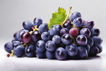 Fototapeta premium Blue grapes bunch isolated on white background