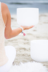 Woman holding crystal bowl 