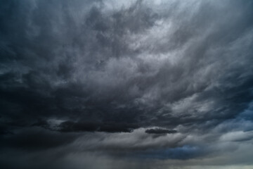 storm sky, dark dramatic clouds during thunderstorm, rain and wind, extreme weather, abstract background