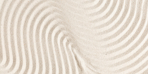 Fototapeta na wymiar Sand pattern as background. Zen pattern in white sand. Beach sand texture in summer sun.