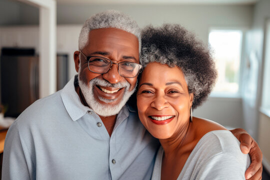 Timeless Love: A Happy Senior Black Couple Grinning in a Cherished Family Portrait.


