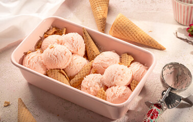 Strawberry pink ice cream with waffles, summer 