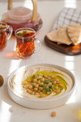Healthy plate of Hummus with olive oil for breakfast