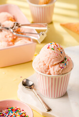 Strawberry pink ice cream with waffles, summer 