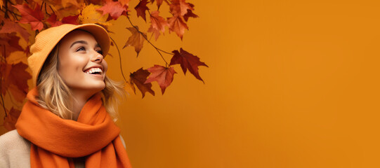 Young Woman in Fall/Autumn Clothes on an Orange Banner with Space fro Copy