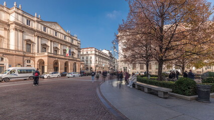 Panorama showing theater La Scala timelapse and a monument to Leonardo da Vinci - obrazy, fototapety, plakaty