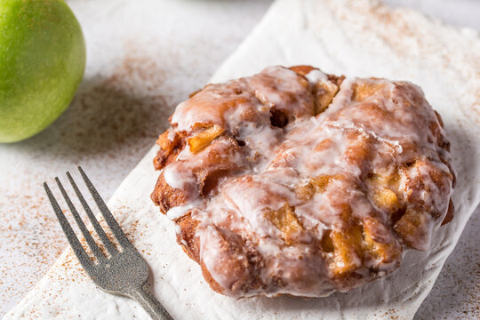 Apple fritter donut with cinnamon