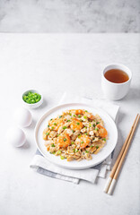 Shrimp  scrambled eggs with scallion in a plate