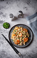 Shrimp  scrambled eggs with scallion in a plate