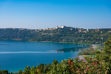 Obraz premium Castel Gandolfo, view on green Alban hills overlooking volcanic crater lake Albano, Castelli Romani, Italy in summer