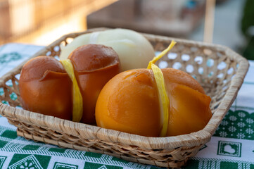 Italian semi hard handmade smoked scamorza cheese, from cow milk from Apulia or Calabria regions close up