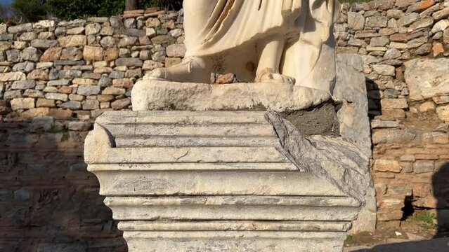 A headless statue in Ephesus Ancient City. Dedicated to the name of doctor Alexander, which is important for the ancient city. Selcuk, Izmir, Turkey