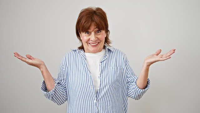 Middle age woman standing clueless over isolated white background