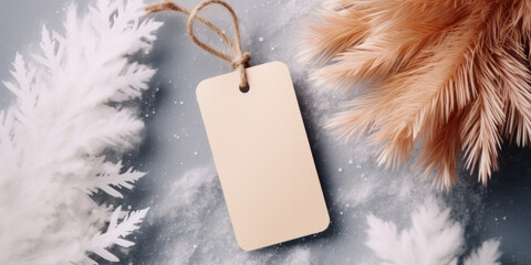 Empty beige gift tag. Paper label on a snowy background. Minimal winter still life. Christmas, seasonal sale, discount concept. View from above.