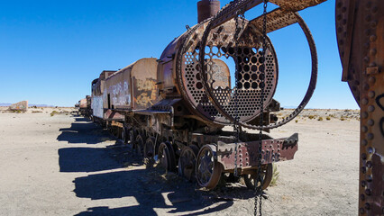Abandoned train cemetery with 100-year-old steam locomotives in Uyuni (Bolivia). They were used by mining companies in the 1900.