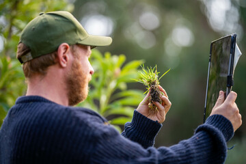 farming using technology on a farm being innovative and connected. working in agriculture