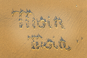 Text in the sand on the beach at the Northern Sea - Moin Moin