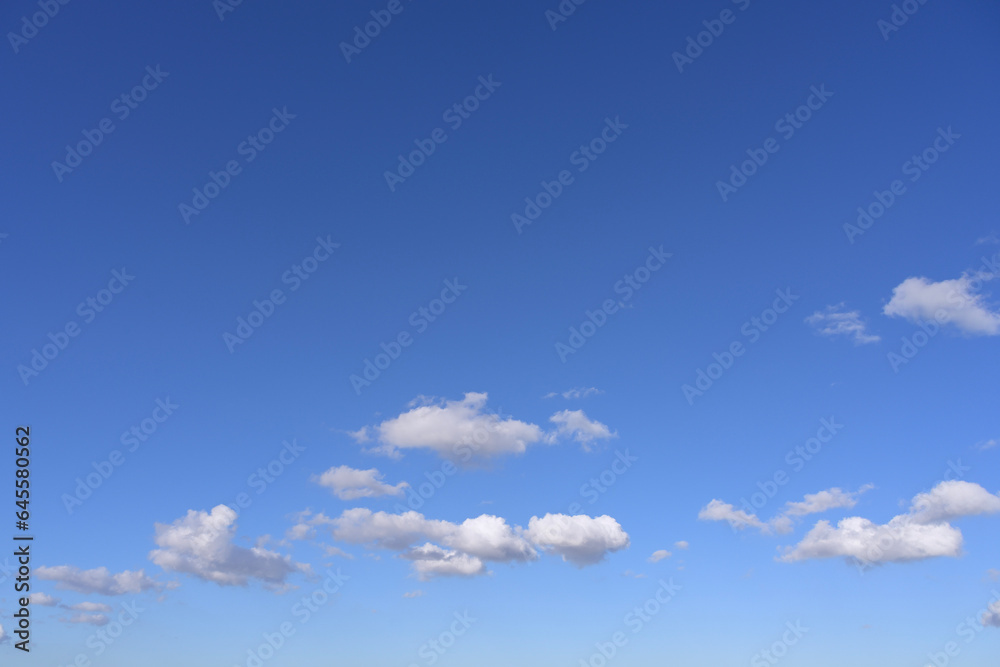 Wall mural blue sky with clouds