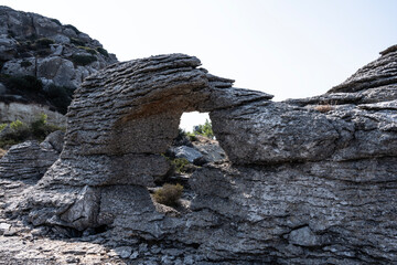 Beautiful and unusual rocks and mountains with a sunny summer day on the island of Crete