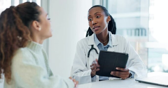 Doctor, tablet and black woman consultation with patient about medical diagnosis, hospital test or health. Clinic, client relief and professional surgeon consulting with person on good exam results
