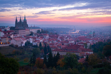 Daybreak in the capital of Czech Republic, Prague. The old city, including the Prague Castle and Vltava river, under the colorful morning sky. - 645602737