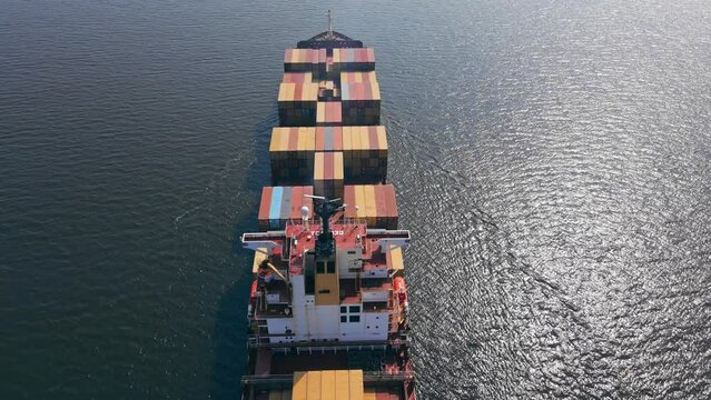 Container intermodal carrier ship Cargo ship of international travel sea freight around the world, Aerial shot