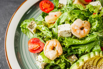 delicious fresh salad with shrimp, blue cheese and avocado
