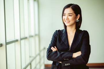 young business woman Strong energy to be successful in business, work and making money, joy, smile, confidence and good vision and a good work strategy.