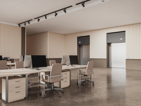 Beige coworking room interior with pc computers on desk in row, elevators