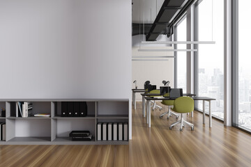 Modern coworking interior with table and chairs, shelf and window. Mock up wall