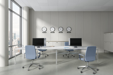 Fototapeta premium Cozy coworking interior with technology, drawer with clock and panoramic window